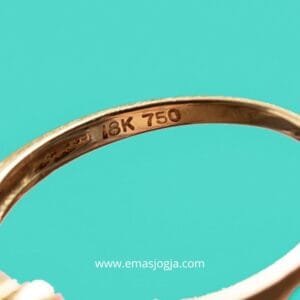 kode emas 18k